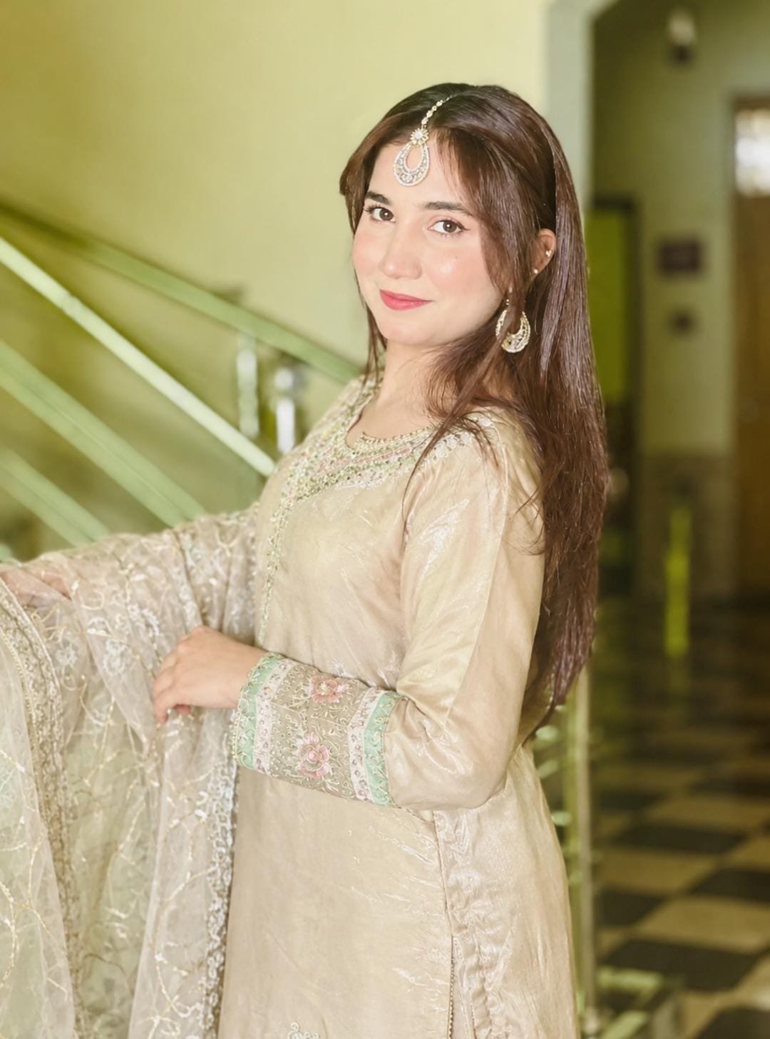 A candid moment of Mahnoor in her brown outfit